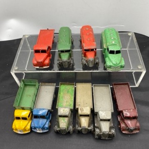 566 - Ten Dinky Toys Trucks/Wagons, Dinky Toys 343 Dodge Farm Tipper Tip Action missing Two flat tyres (F)... 