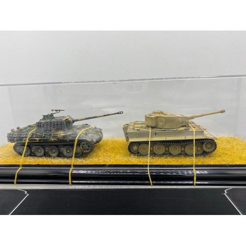 532 - 2 tanks in display case metal & plastic - Models Very Good, case Good (2) 520g