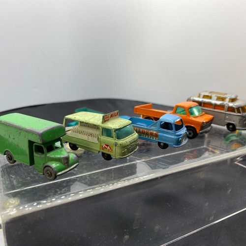 12 - 28 die-cast play-worn Lesney vehicles, plus two petrol pumps, also Mighty Midget Benbros milk cart (... 