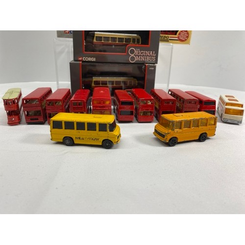 21 - Buses Galore - 8 boxed/carded plus another 13 play-worn buses/trams, includes boxed Corgi Cardiff Me... 