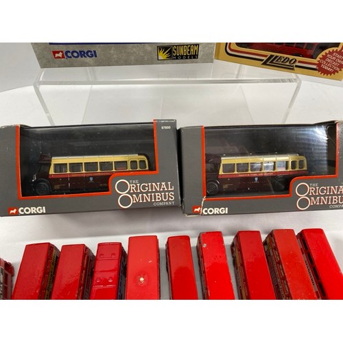 21 - Buses Galore - 8 boxed/carded plus another 13 play-worn buses/trams, includes boxed Corgi Cardiff Me... 