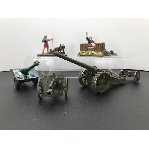 106 - Three Die-cast Field Guns and Two Medieval Battle Scenes, Britains Field Gun with Functioning Spring... 