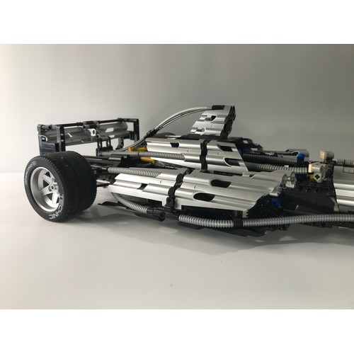 144 - Lego Technic 8458-1 Silver Champion Built with Box, First released in 2000, Appears Complete (except... 