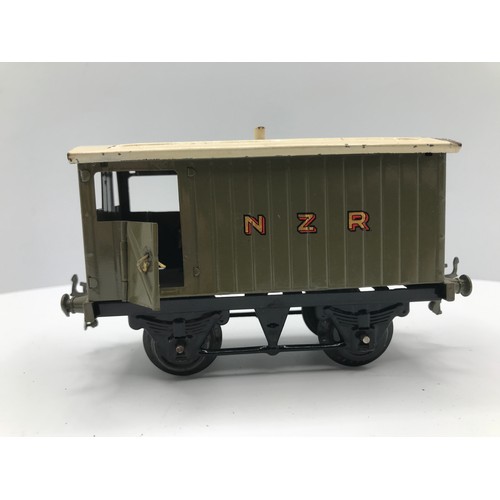 215 - Four Hornby No.1 Wagons, Three NZR and Wakefield Castrol Tanker, NZR Brake Van and NZR Open Wagon in... 