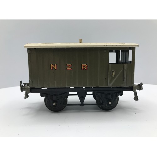 215 - Four Hornby No.1 Wagons, Three NZR and Wakefield Castrol Tanker, NZR Brake Van and NZR Open Wagon in... 