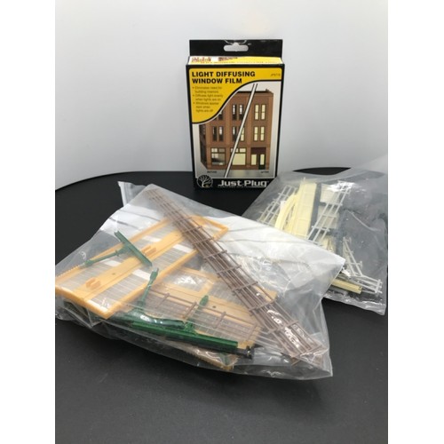 439 - A Large Lot of OO Gauge 1:76 Scale Scenic Items, including Oxford vehicles, buildings, trees and mor... 