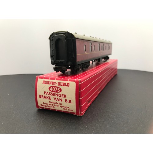 348 - Four Hornby Dublo BR Coaches 4075 (2) 4076 and 4052, All boxed, Two Passenger Brake Vans 4075, Six-W... 