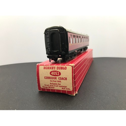 348 - Four Hornby Dublo BR Coaches 4075 (2) 4076 and 4052, All boxed, Two Passenger Brake Vans 4075, Six-W... 