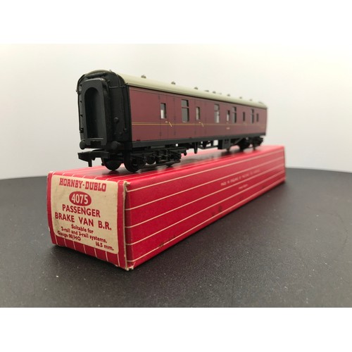 348 - Four Hornby Dublo BR Coaches 4075 (2) 4076 and 4052, All boxed, Two Passenger Brake Vans 4075, Six-W... 