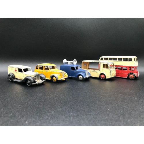 38 - Five Dinky Toys 30F Ambulance (Fair), 34C Loudspeaker Van Blue (Good), 40H Austin Taxi (Fair), 30V N... 