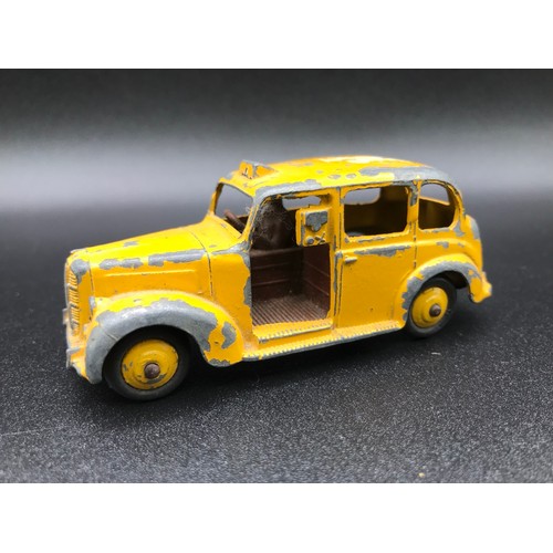 38 - Five Dinky Toys 30F Ambulance (Fair), 34C Loudspeaker Van Blue (Good), 40H Austin Taxi (Fair), 30V N... 