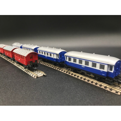 388 - Two 'N' Gauge Rakes of Continental Arnold Coaches/Cars, 'Ready-to-Roll', - Good (7) 400g