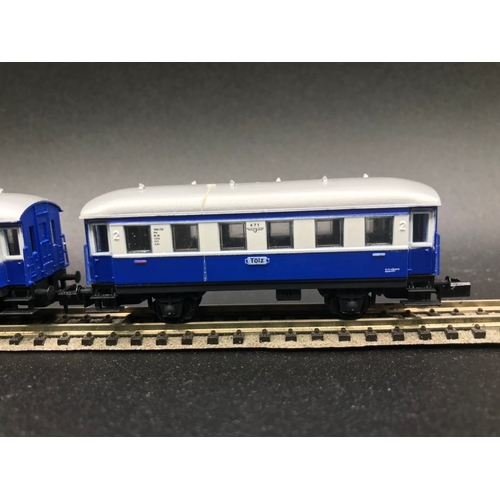 388 - Two 'N' Gauge Rakes of Continental Arnold Coaches/Cars, 'Ready-to-Roll', - Good (7) 400g