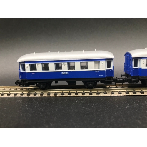 388 - Two 'N' Gauge Rakes of Continental Arnold Coaches/Cars, 'Ready-to-Roll', - Good (7) 400g