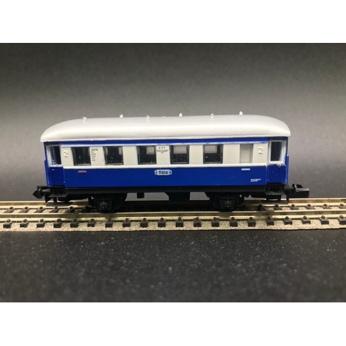 388 - Two 'N' Gauge Rakes of Continental Arnold Coaches/Cars, 'Ready-to-Roll', - Good (7) 400g