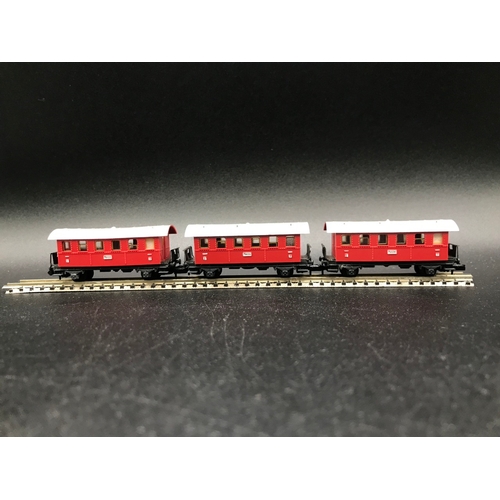 388 - Two 'N' Gauge Rakes of Continental Arnold Coaches/Cars, 'Ready-to-Roll', - Good (7) 400g