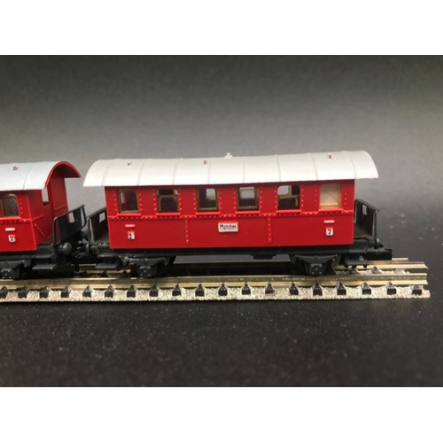 388 - Two 'N' Gauge Rakes of Continental Arnold Coaches/Cars, 'Ready-to-Roll', - Good (7) 400g