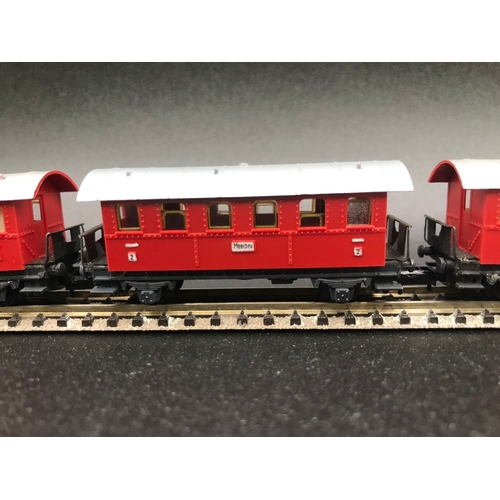 388 - Two 'N' Gauge Rakes of Continental Arnold Coaches/Cars, 'Ready-to-Roll', - Good (7) 400g