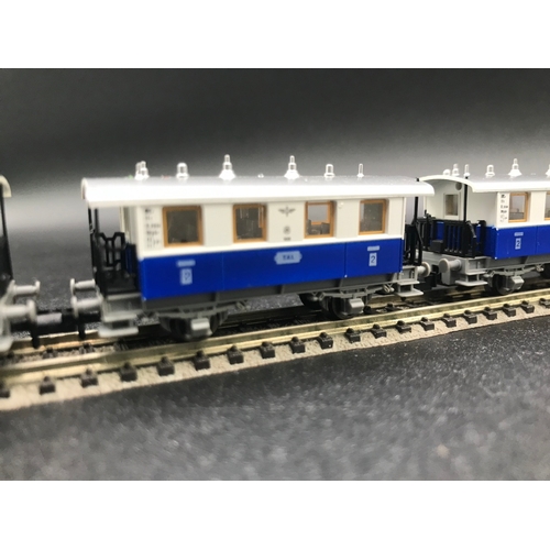 389 - Two three Coach/Car Rakes of Fleischmann Piccolo TAL Continental rolling-stock, combine to make long... 