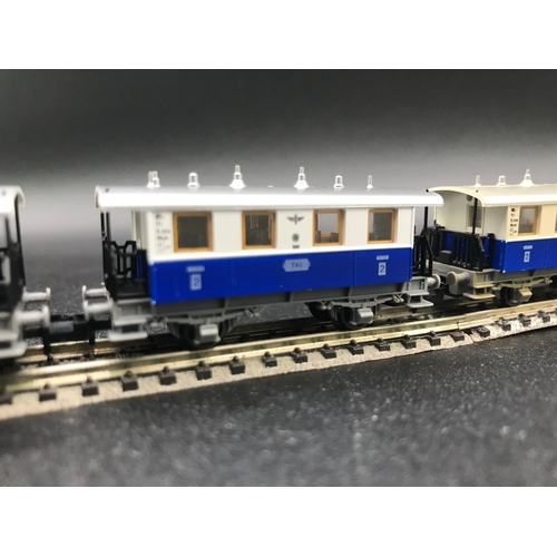 389 - Two three Coach/Car Rakes of Fleischmann Piccolo TAL Continental rolling-stock, combine to make long... 