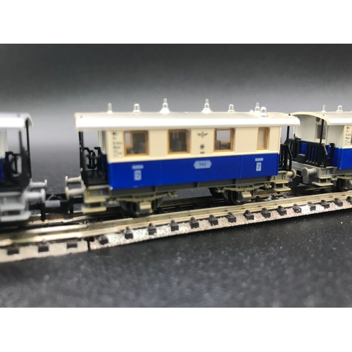 389 - Two three Coach/Car Rakes of Fleischmann Piccolo TAL Continental rolling-stock, combine to make long... 