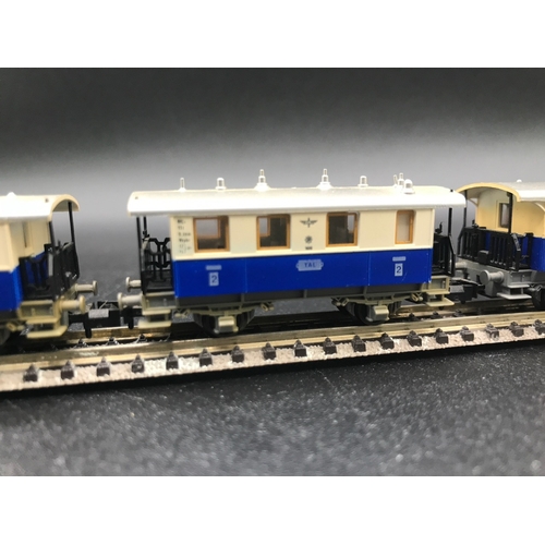 389 - Two three Coach/Car Rakes of Fleischmann Piccolo TAL Continental rolling-stock, combine to make long... 