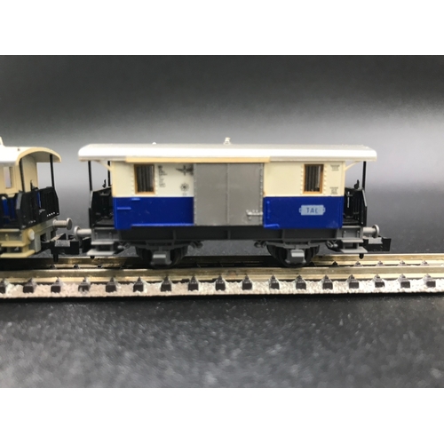 389 - Two three Coach/Car Rakes of Fleischmann Piccolo TAL Continental rolling-stock, combine to make long... 