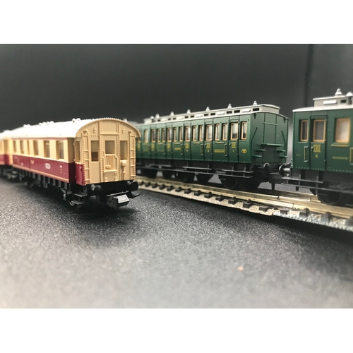 392 - Two Rakes of 'N' Gauge Fleischmann Piccolo Cars/Coaches, 50cm Rake of Seven and 27 Rake of Three DB ... 