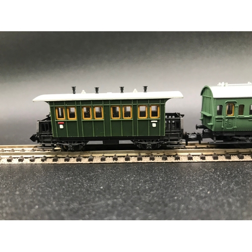 395 - Two 'N' Gauge Trix Rakes of Four and Three Cars/Coaches, Munchen Hamburg 6 Wheel coaches (Very Good)... 