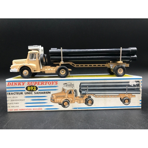 36 - Dinky Supertoys 893 Unic Sahara Tractor with Pipe Carrier Semi-Trailer, includes six pipes, with Win... 