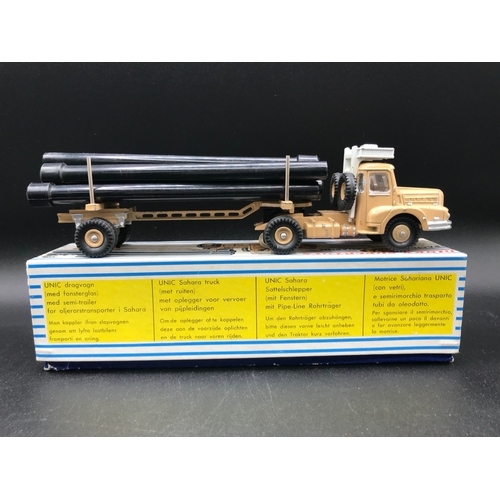 36 - Dinky Supertoys 893 Unic Sahara Tractor with Pipe Carrier Semi-Trailer, includes six pipes, with Win... 