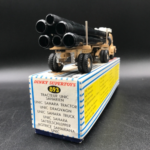 36 - Dinky Supertoys 893 Unic Sahara Tractor with Pipe Carrier Semi-Trailer, includes six pipes, with Win... 