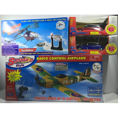 140 - Four Radio Controlled Helicopter, Spitfire style aeroplane and two Minis, Appear as New and not remo... 