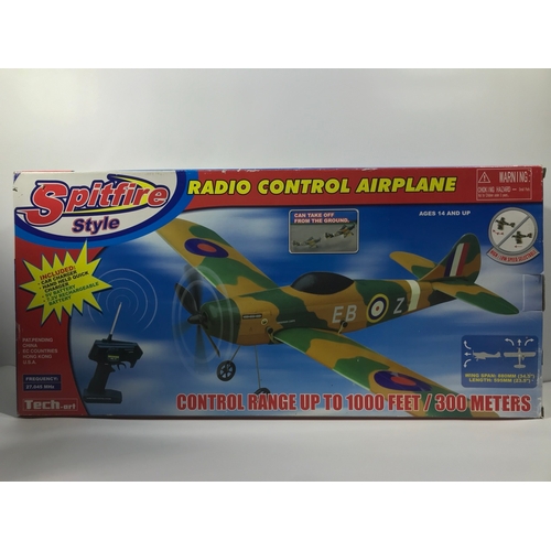 140 - Four Radio Controlled Helicopter, Spitfire style aeroplane and two Minis, Appear as New and not remo... 