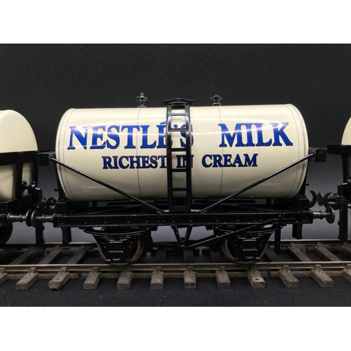 240 - Ace 4 Wheel Tank Mixed Set of Three Tinplate Milk Tanks United Dairies, Express Dairy and Nestles Mi... 