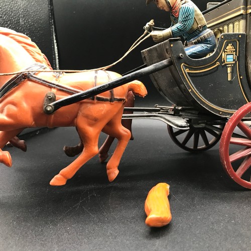 143 - Tin plate Overland Stage Coach Horse Drawn TIN TOY. 17.7 x 7.8 x 5ins. Made in Japan, Battery Operat... 