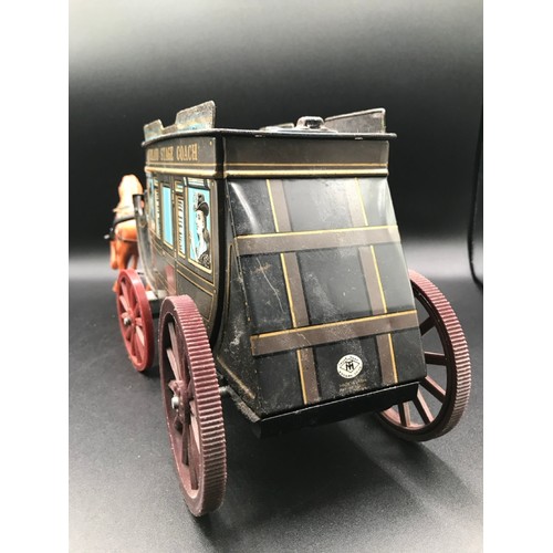 143 - Tin plate Overland Stage Coach Horse Drawn TIN TOY. 17.7 x 7.8 x 5ins. Made in Japan, Battery Operat... 