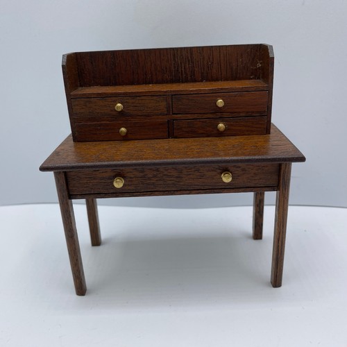 707 - Darkwood House Furniture 1:12. VG. 700g. (12)
Corner Unit
Desk with Side Drawers
Desk
Side table
Sho... 