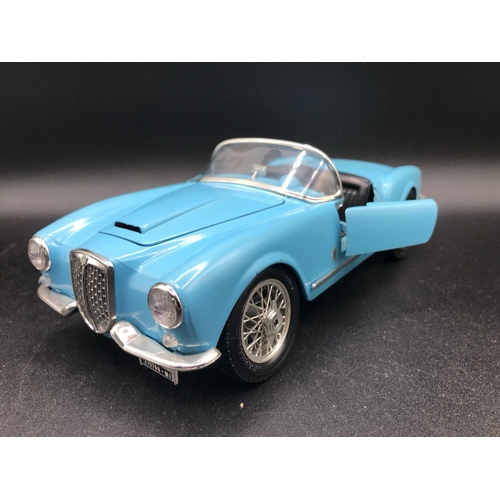 505 - Three Burago 1:18 Die-cast cars, Lancia Aurelia B24 Spider (1955), Alfa Romeo 8C 2300 Monza (1931), ... 