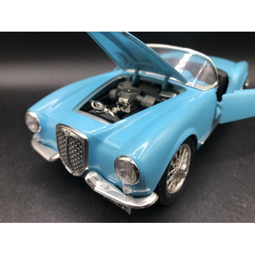 505 - Three Burago 1:18 Die-cast cars, Lancia Aurelia B24 Spider (1955), Alfa Romeo 8C 2300 Monza (1931), ... 