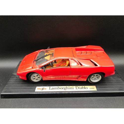 509 - Three Burago 1:18 Die-cast Metal with a Maisto Lamborghini Diablo (1990) box sunlight damage, Each b... 