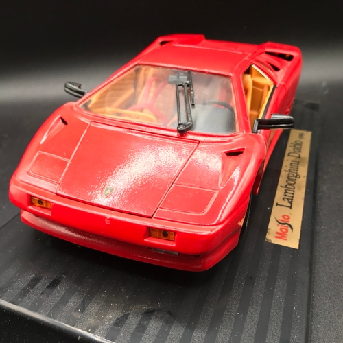 509 - Three Burago 1:18 Die-cast Metal with a Maisto Lamborghini Diablo (1990) box sunlight damage, Each b... 