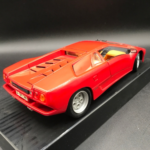 509 - Three Burago 1:18 Die-cast Metal with a Maisto Lamborghini Diablo (1990) box sunlight damage, Each b... 