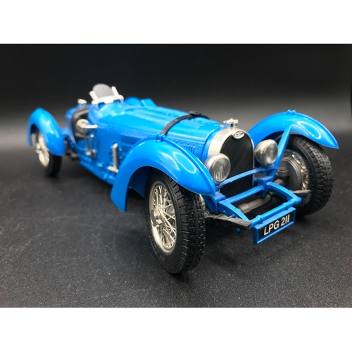 510 - Three 1:18 Burago un-boxed open-top Sports cars, Jaguar 'E' (1961), Bugatti Type '59' (1934), Jaguar... 