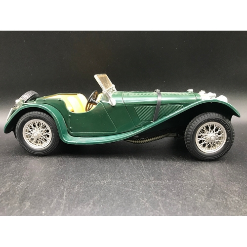 510 - Three 1:18 Burago un-boxed open-top Sports cars, Jaguar 'E' (1961), Bugatti Type '59' (1934), Jaguar... 