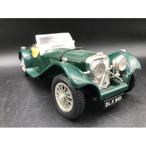 510 - Three 1:18 Burago un-boxed open-top Sports cars, Jaguar 'E' (1961), Bugatti Type '59' (1934), Jaguar... 