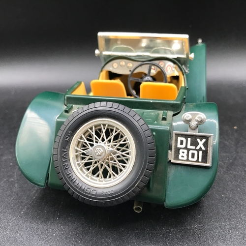 510 - Three 1:18 Burago un-boxed open-top Sports cars, Jaguar 'E' (1961), Bugatti Type '59' (1934), Jaguar... 