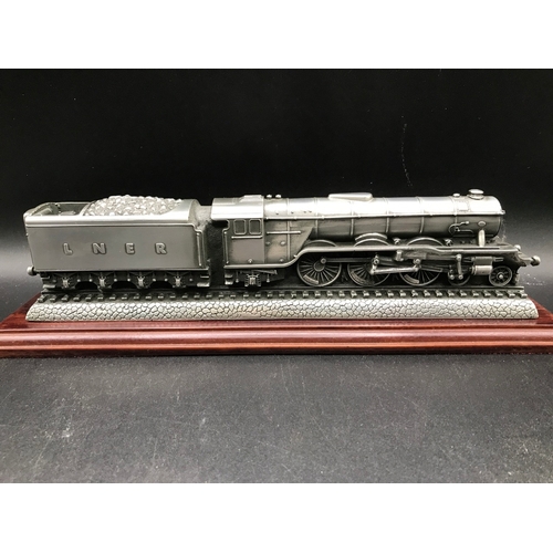 295 - A Flying Scotsman Pewter Sculpture by Compulsion Gallery on a wooden plinth and custom case, along w... 