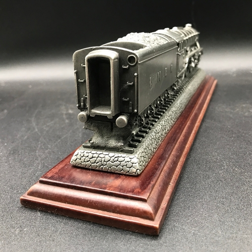 295 - A Flying Scotsman Pewter Sculpture by Compulsion Gallery on a wooden plinth and custom case, along w... 