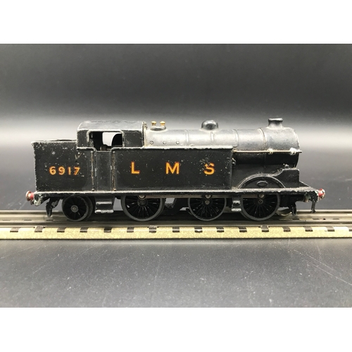 92 - Two Dublo 3-Rail Locomotives, Silver King 4-6-2 No.60016 Tested Runner (Fair), together with Black L... 